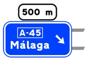 Preseñalización de salida (cartel sobre la calzada, multicarril)